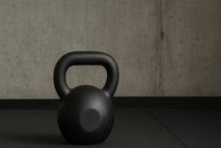 How to Use Kettlebells: A Beginner’s Guide to Form, Weight & Workout Tips
